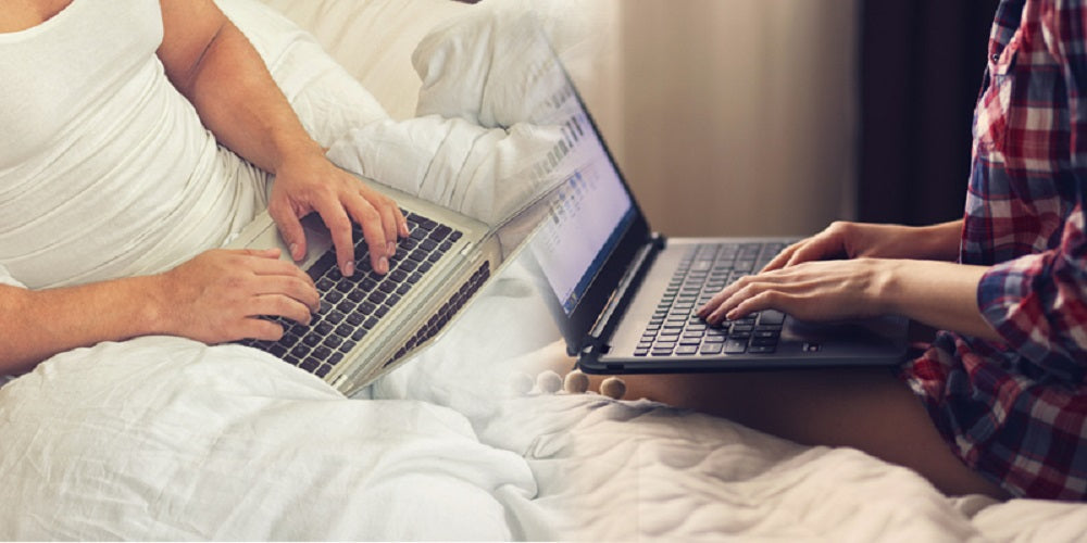 Couple on laptops discover the value of a long distance date kiiroo